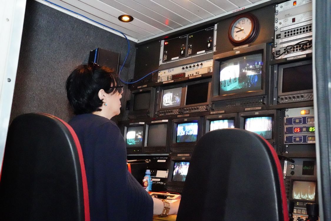 Broadcast & Contribution 2 Operator monitoring video feeds in a television broadcast control room